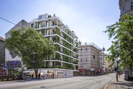 Blick auf die Schönbrunnerstraße mit einem modernen Haus mit Fassadenbegrünung sowie der umliegenden Straße.